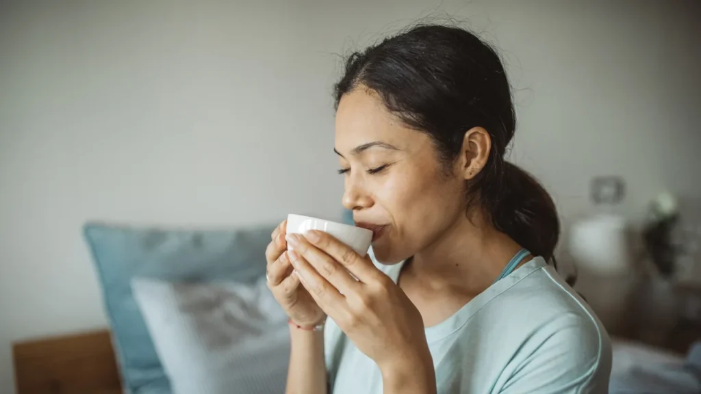 Girl taking green virgin moringa tea